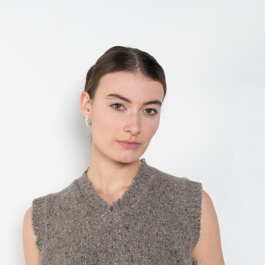 The High V-Vest by 6397 is a sleeveless vest in an almost silk-like soft speckled wool