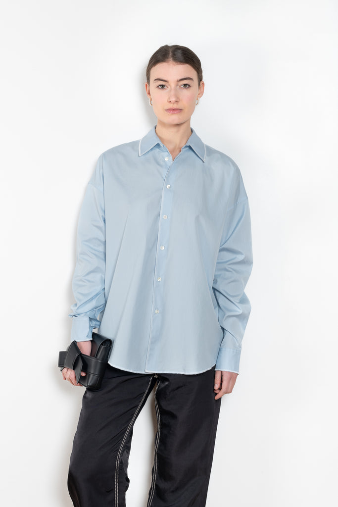 The Overlock Uniform Shirt by 6397 is a signature oversized cotton shirt with a contrasted overlock stitch detail and a subtle dropped shoulder