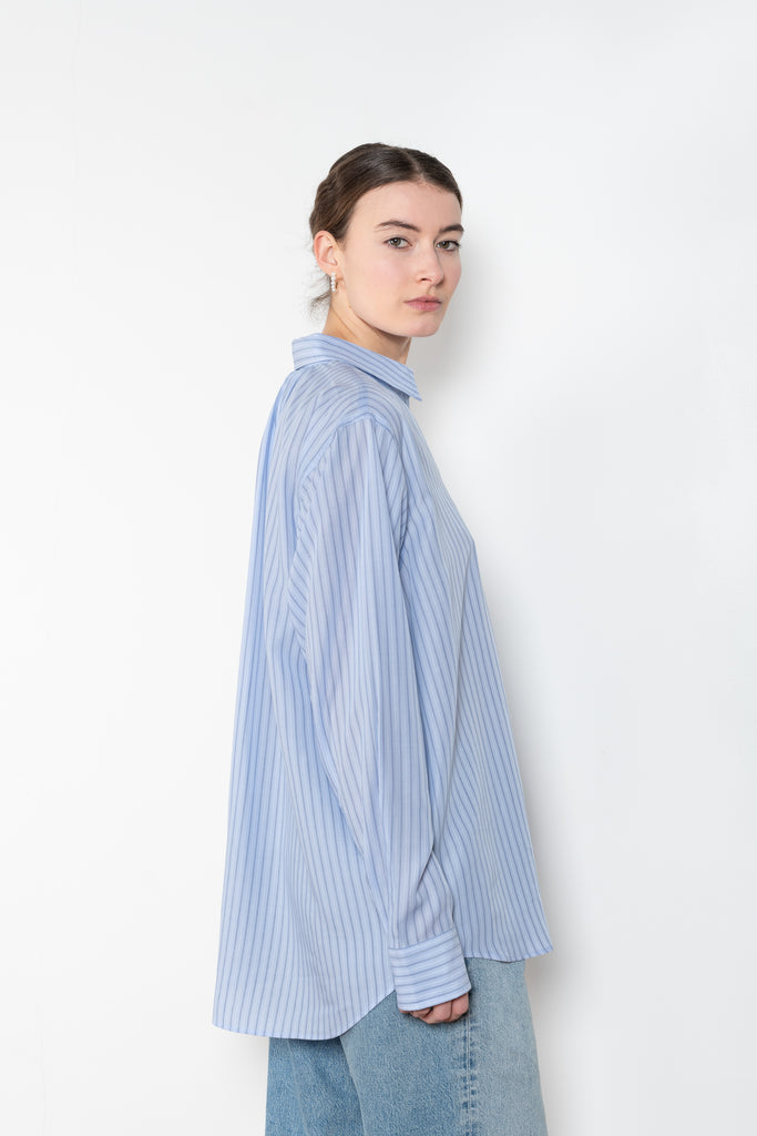 The Ruched Biggie Shirt by 6397 is a signature striped oversized shirt in a soft fluid tencel