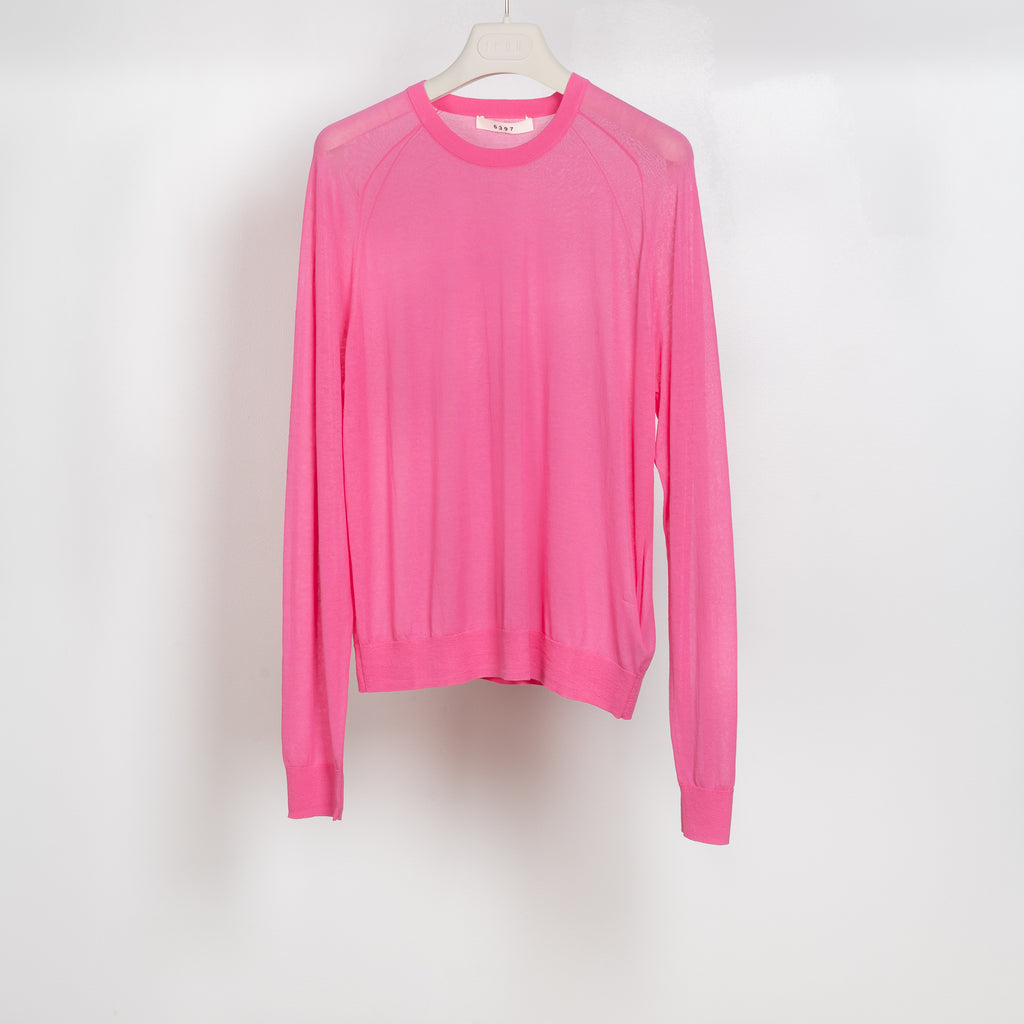 The Sheer Crew by 6397 is a bubblegum loose top in a fine sheer knit