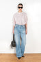 The 2021 Loose Fit Jeans by Acne Studios are cut to a loose fit with mid-waist, wide leg and long length