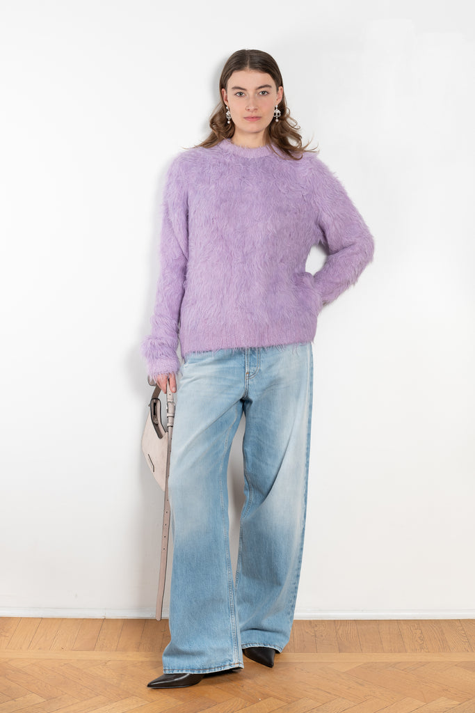 The 1981F Jeans by Acne Studios are cut to a loose fit with a low waist, wide leg and long length