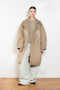 The Belted Trench Coat by Acne Studios is a cotton twill trench with a garment-dyed finish and an Acne Studios logo patch at the centre back