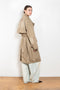 The Belted Trench Coat by Acne Studios is a cotton twill trench with a garment-dyed finish and an Acne Studios logo patch at the centre back