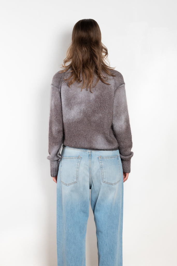 The Spray Finished Cardigan by Acne Studios is crafted from a wool mohair blend with a distinct sprayed finish