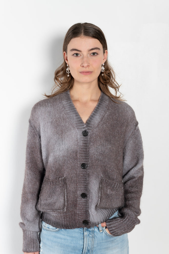 The Spray Finished Cardigan by Acne Studios is crafted from a wool mohair blend with a distinct sprayed finish