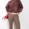 The Check Tailored Trousers by Acne Studios are made in a wool blend with a bouclé check finish