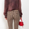 The Check Tailored Trousers by Acne Studios are made in a wool blend with a bouclé check finish