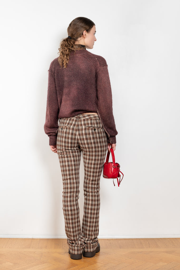 The Check Tailored Trousers by Acne Studios are made in a wool blend with a bouclé check finish