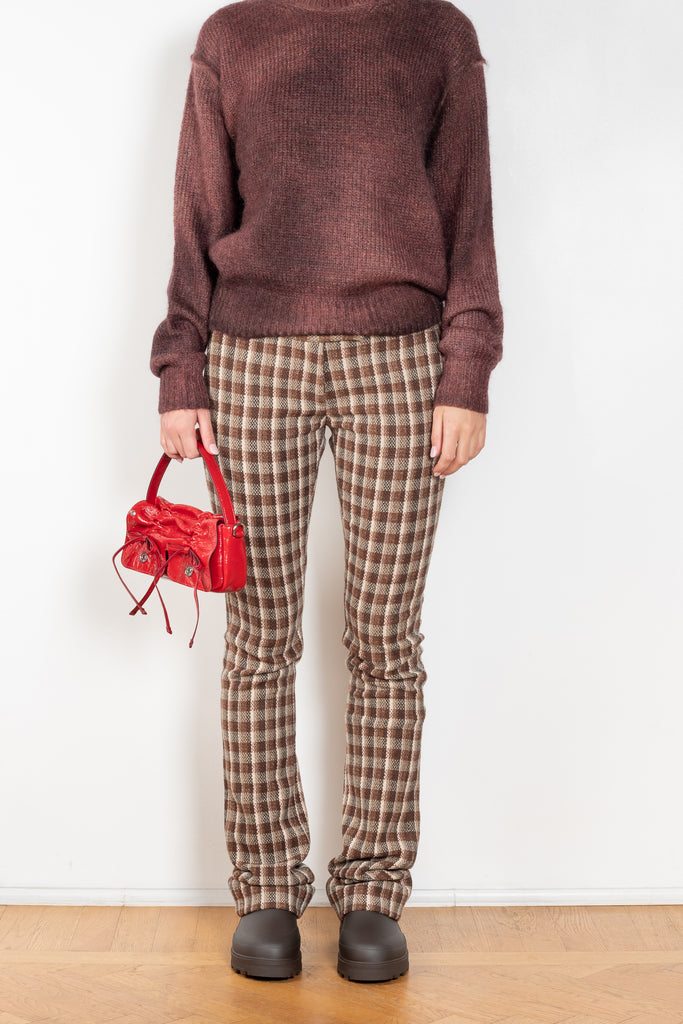 The Check Tailored Trousers by Acne Studios are made in a wool blend with a bouclé check finish