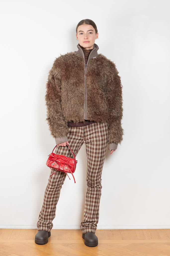 The Check Tailored Trousers by Acne Studios are made in a wool blend with a bouclé check finish