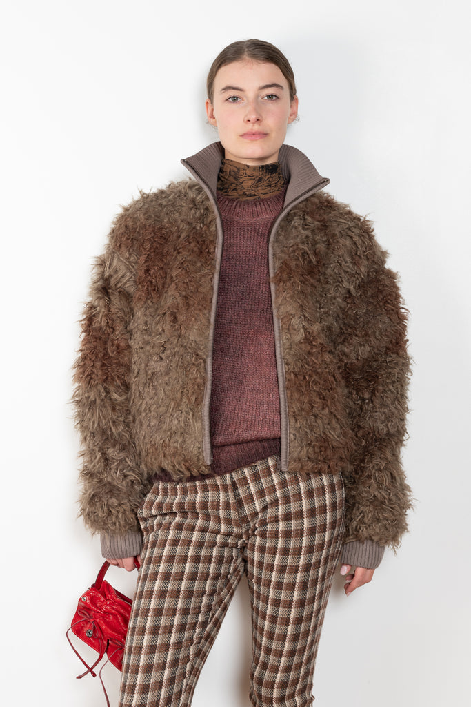 The Check Tailored Trousers by Acne Studios are made in a wool blend with a bouclé check finish