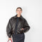 The Coated Bomber by Acne Studios has a coated leather finish