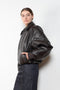 The Coated Bomber by Acne Studios has a coated leather finish