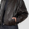 The Coated Bomber by Acne Studios has a coated leather finish