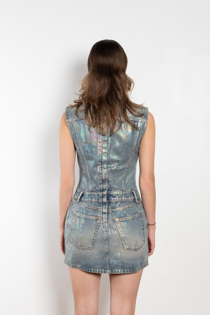 The Coated Denim Dress by Acne Studios is a sleeveless cotton denim twill dress with an iridescent and coated finish