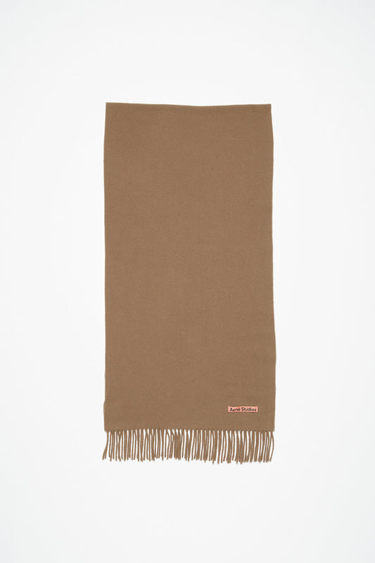 The Fringe Wool Scarf Narrow by Acne Studios bubble is detailed with a pink Acne Studios label and crafted from midweight wool