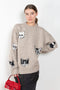 The Jacquard Jumper by Acne Studios has seasonal cat jacquard animations