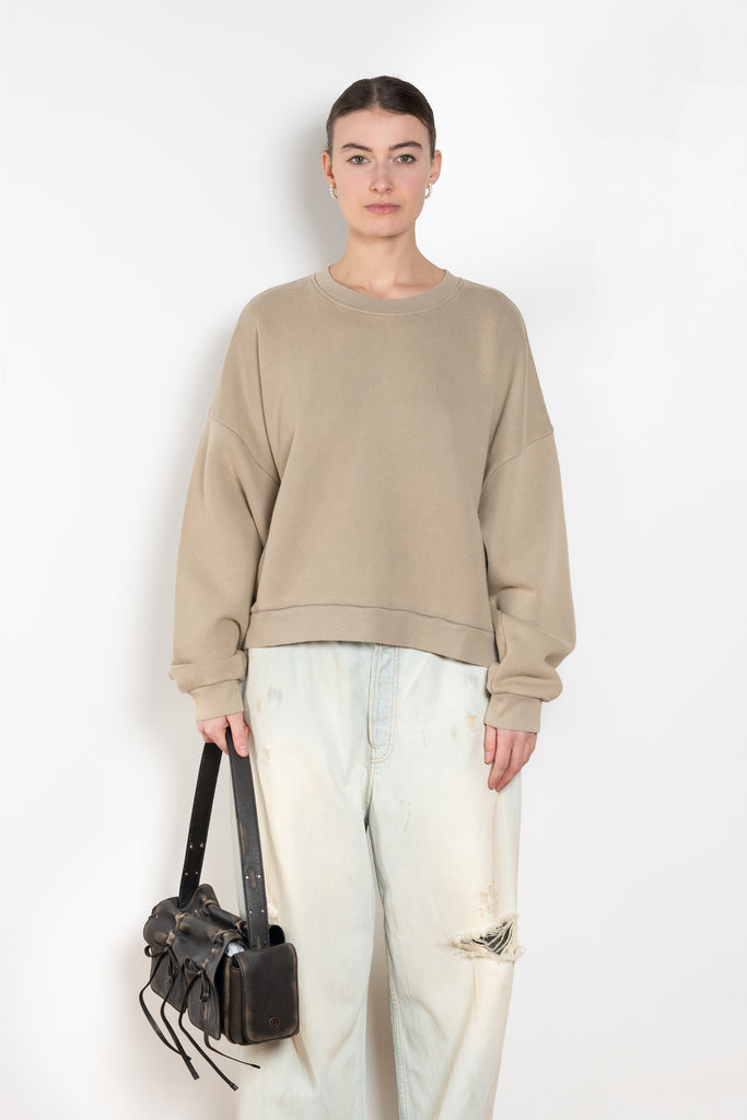 The Logo Patch Sweater by Acne Studios has a relaxed unisex fit