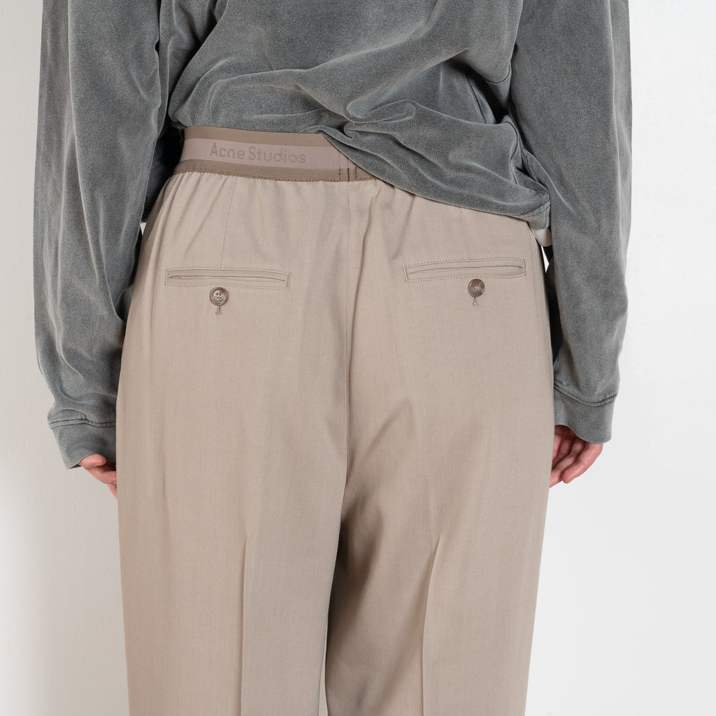 The Logo Tape Trouser 1265 by Acne Studios are crafted from a twill wool blend