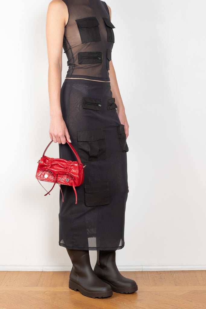 The Cargo Mesh Skirt by Acne Studios has functional cargo pockets