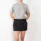 The Pinstripe Skirt by Acne Studios is a mini skirt in a wool cotton blend yarn with a barré pinstripe design