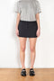 The Pinstripe Skirt by Acne Studios is a mini skirt in a wool cotton blend yarn with a barré pinstripe design