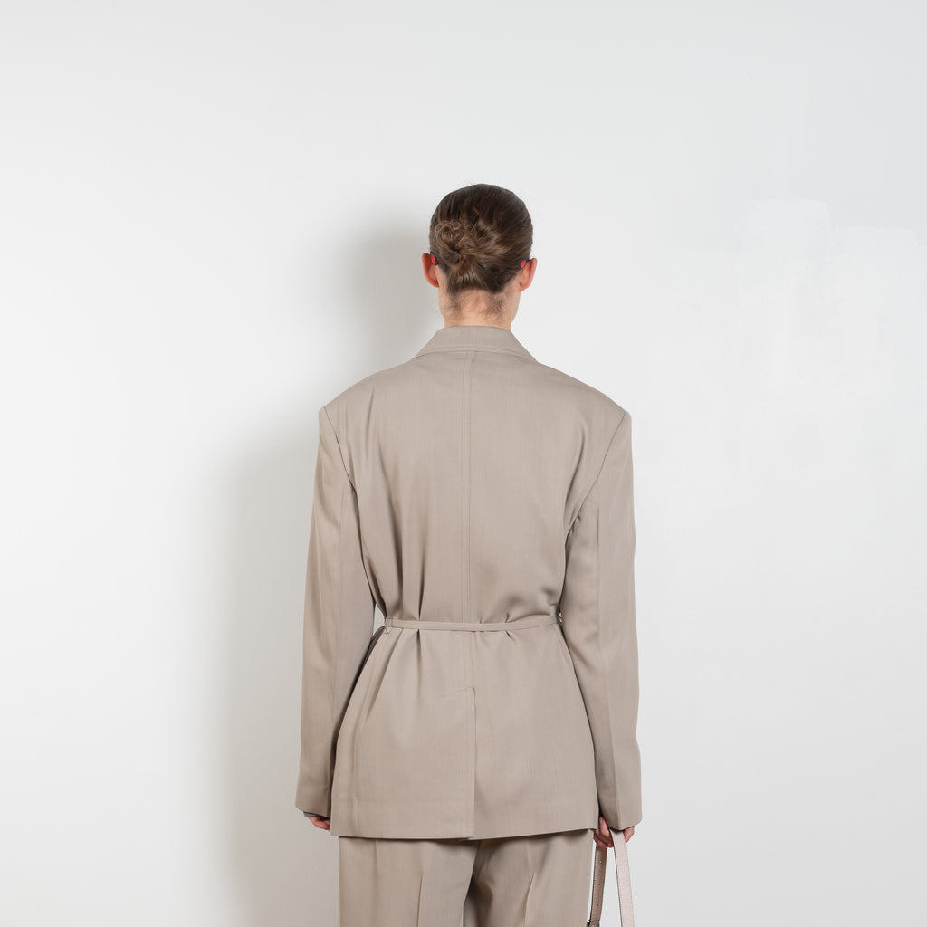 The Suit Jacket 576 by Acne Studios has a relaxed fit with constructed shoulders