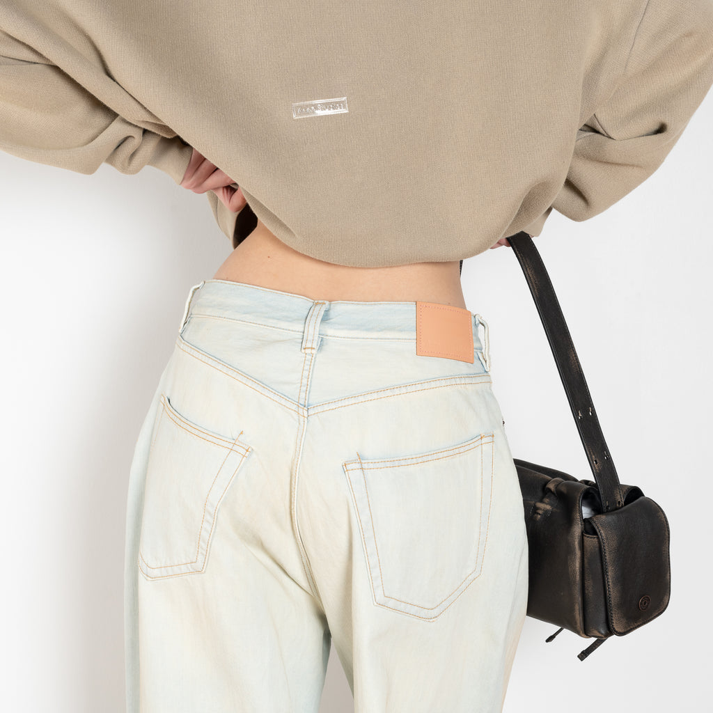 The Super Baggy Jeans 2023 jeans by Acne Studios are cut to a super baggy fit with a mid waist, super wide leg and long length