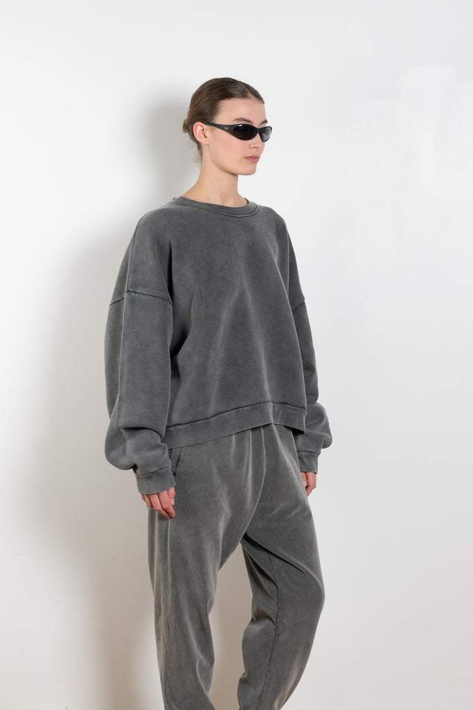 The Sweat 0017 by Acne Studios is a signature sweater with a small rubber logo patch on the back