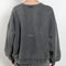 The Sweat 0017 by Acne Studios is a signature sweater with a small rubber logo patch on the back