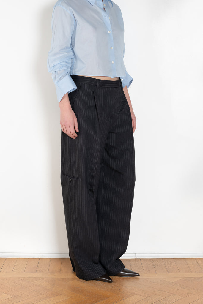 Tailored Pinstripe Trouser by Acne Studios is a relaxed suiting trouser with cargo inspired side leg pockets