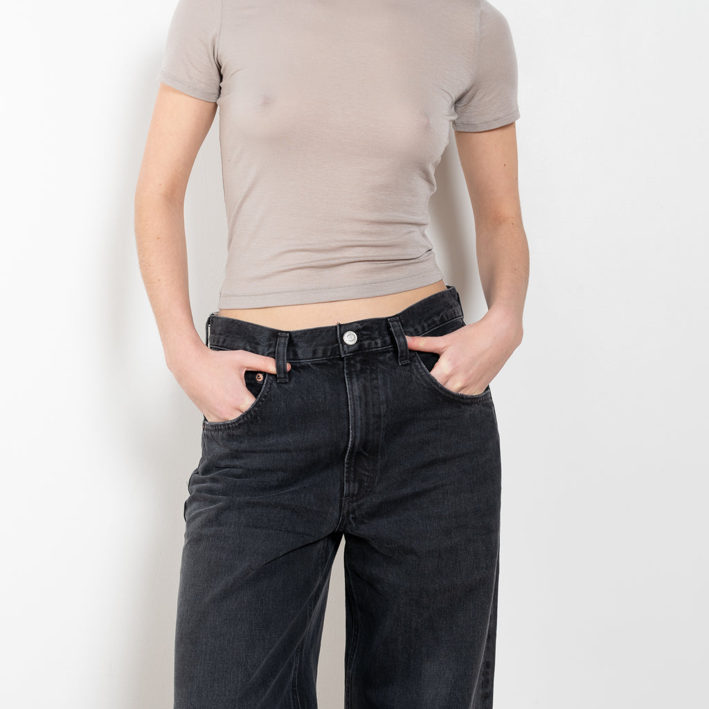 The Low Curve Jeans by Agolde has a sleek, low curved out seam gently tapers down to the ankle