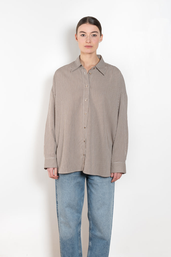 The Roux Shirt Agolde is made from an airy cotton-poplin and billowy sleeves that complement the oversized fit