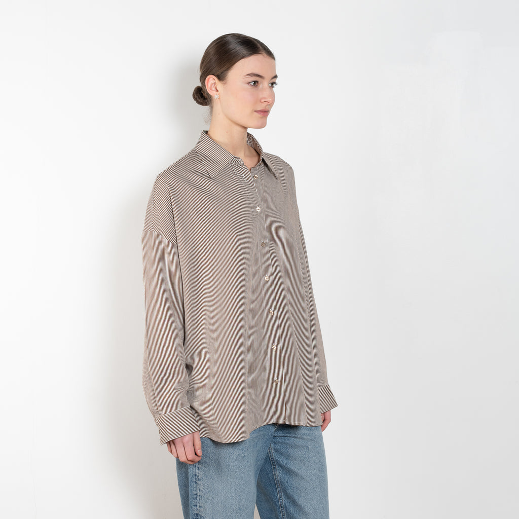 The Roux Shirt Agolde is made from an airy cotton-poplin and billowy sleeves that complement the oversized fit