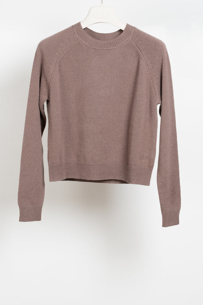 The Mini Mila sweater by Alexandra Golovanoff is a signature round neck sweater with a shorter cut for a fitted look