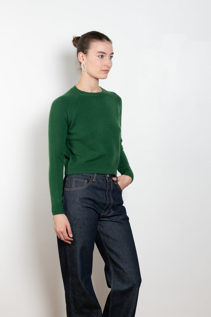 The Mini Mila Sweater by Alexandra Golovanoff is a signature round neck sweater with a shorter cut for a fitted look