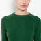 The Mini Mila Sweater by Alexandra Golovanoff is a signature round neck sweater with a shorter cut for a fitted look