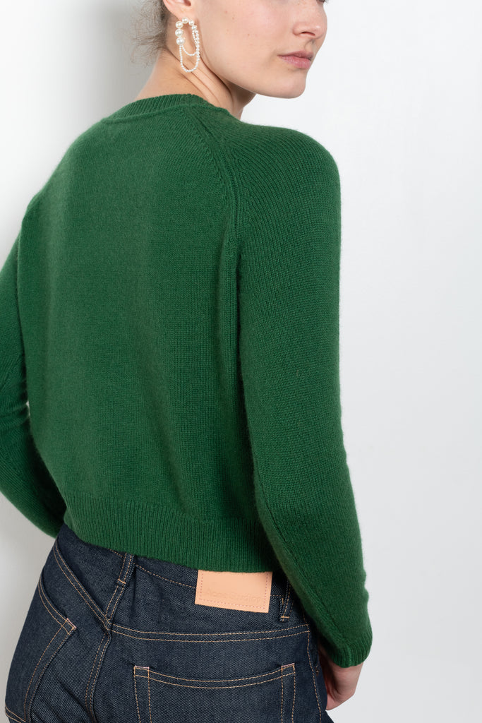 The Mini Mila Sweater by Alexandra Golovanoff is a signature round neck sweater with a shorter cut for a fitted look