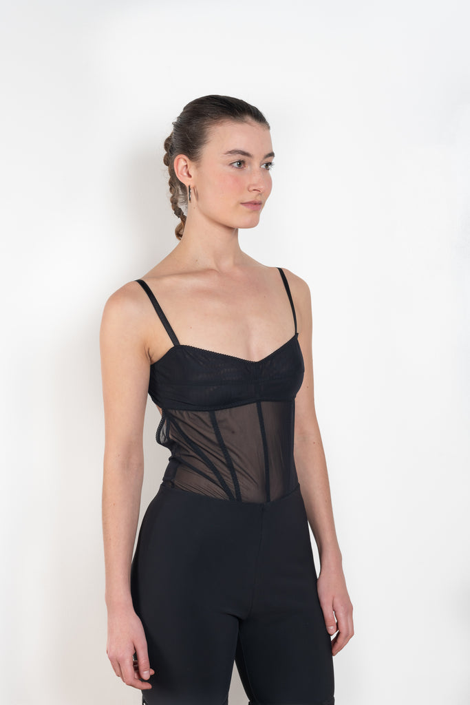 The Ada Bodysuit by Anna October features a corset bodice