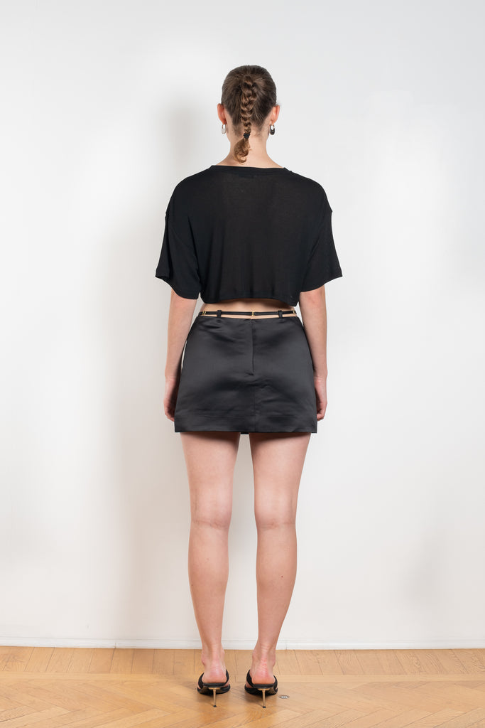 The Keren Mini Skirt by Anna October is a satin mini skirt with a lingerie inspired straps in the waist