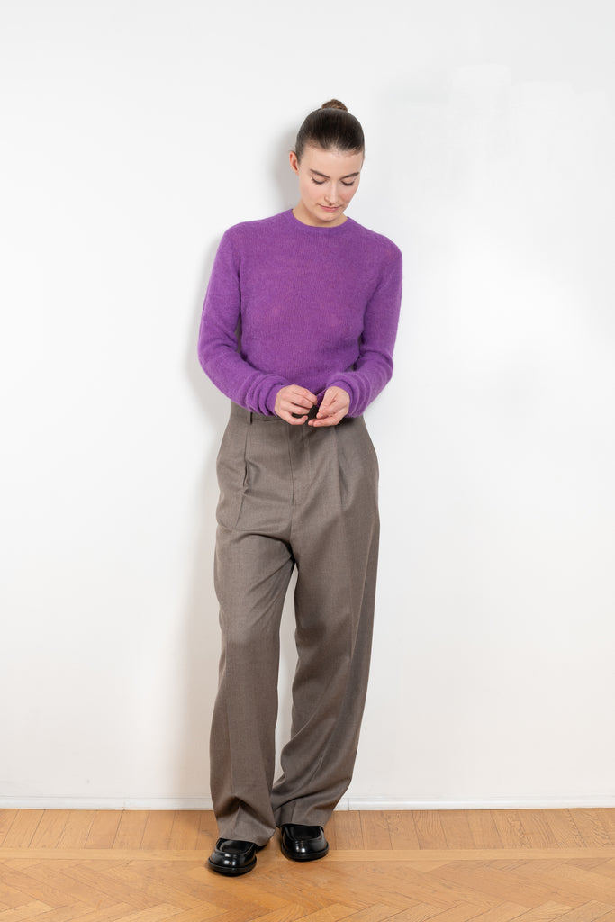 The Light Wool Slacks by Auralee is a relaxed trouser with pleats in a wool Gabardine fabric