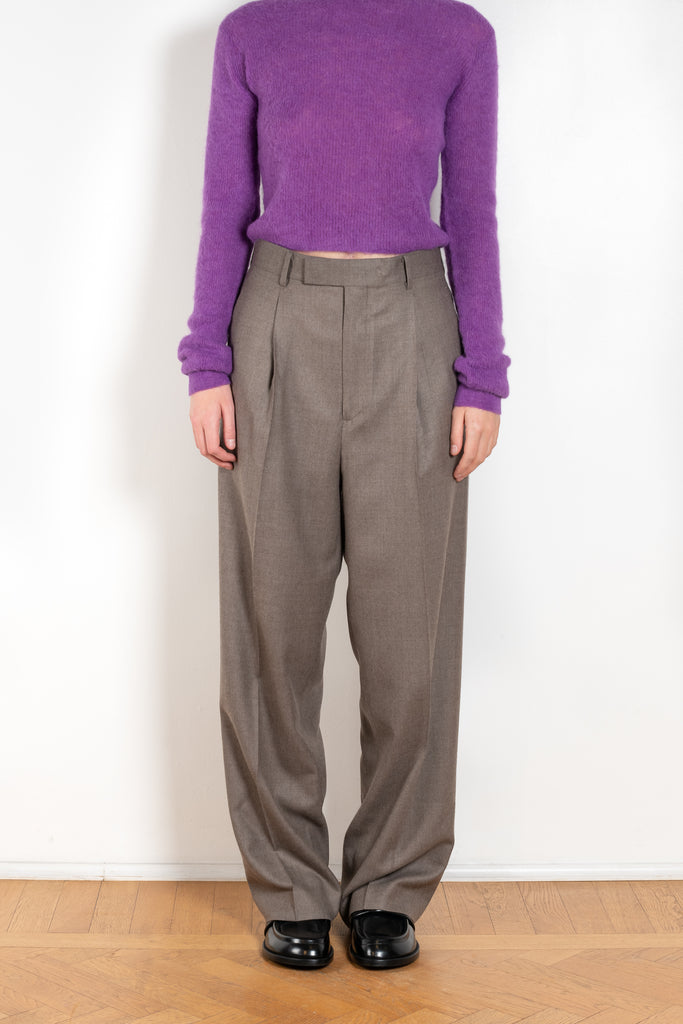 The Light Wool Slacks by Auralee is a relaxed trouser with pleats in a wool Gabardine fabric