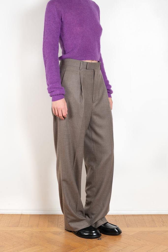 The Light Wool Slacks by Auralee is a relaxed trouser with pleats in a wool Gabardine fabric