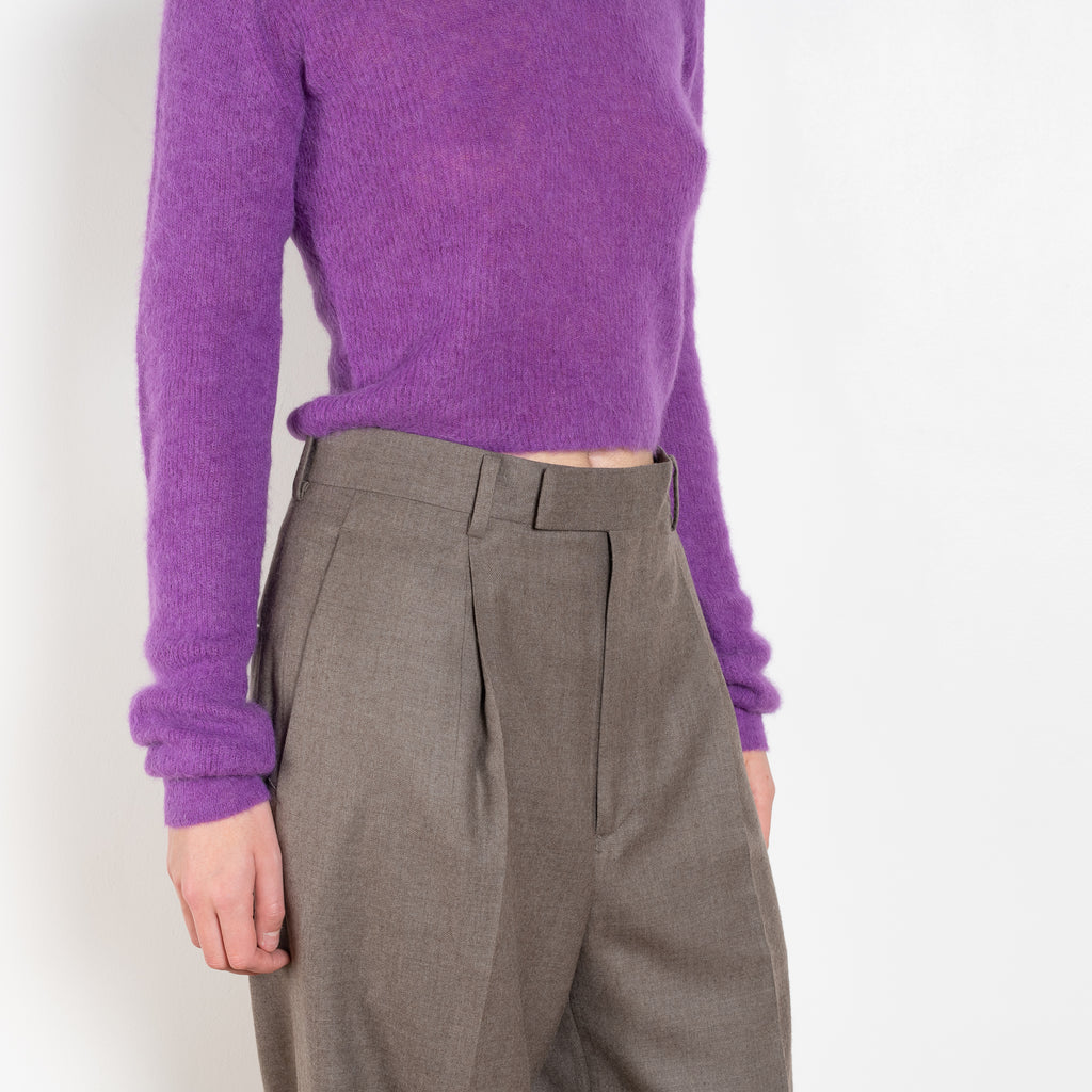 The Light Wool Slacks by Auralee is a relaxed trouser with pleats in a wool Gabardine fabric