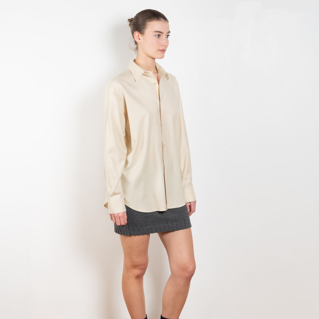 The Light Wool Shirt by Auralee is a loose button up shirt in a soft wool