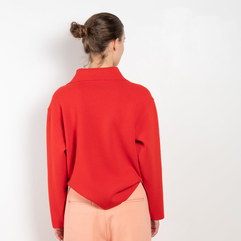 The Milano Rib Knit by Auralee is a relaxed sweater with a half zip closure in a Milano rib