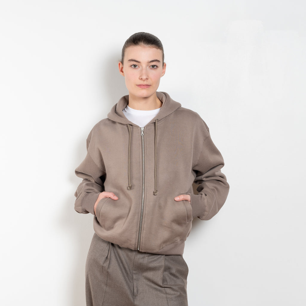 The Sweat Zip Parka by Auralee Sweat is a zipped hoodie crafted using a rare knitting machine