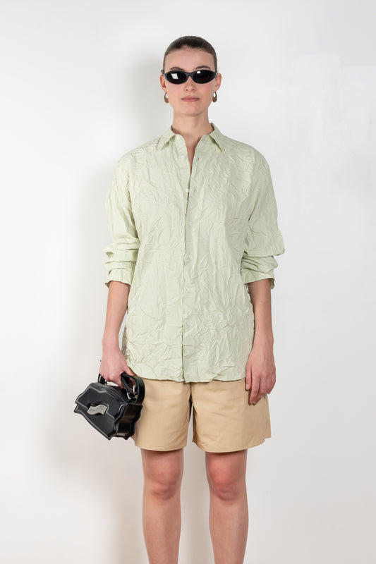 The Twill Shirt by Auralee is a regular shirt in a crinkled pale green cotton