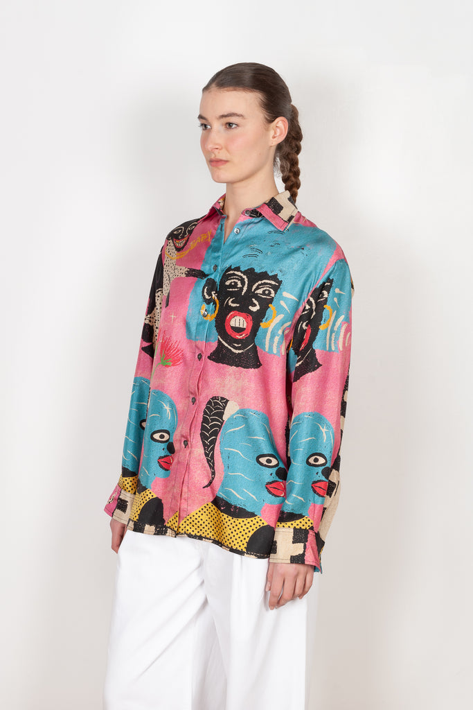 The Classic Shirt by Botter is a signature relaxed silk shirt in a seasonal pink heads print